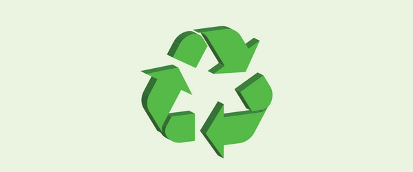 Recycling symbol on green background