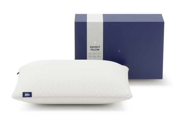 Nolah Squishy Pillow beside box